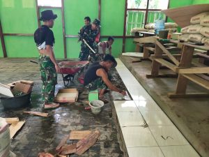 Satgas TMMD Kodim Ketapang Pasang Keramik Gereja Santo Yohanes