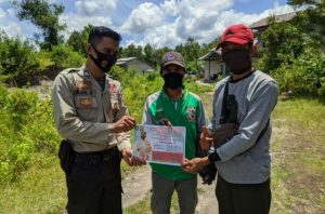 Sosialisasi Prokes, Polisi Bersama Warga Cegah Covid -19