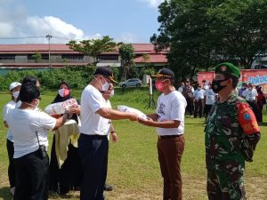 HKN ke-65, Pemkab Sekadau Bagikan 35.000 Masker kepada Masyarakat