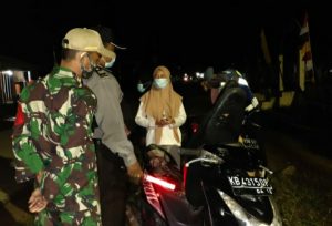 Sosialisasi kepada Masyarakat tentang Prokes di Wilayah Meliau