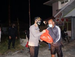 Kapolres Kubu Raya Pimpin Patroli Skala Besar dan Bagikan Sembako