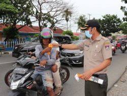 BPBD Padang Gencar Sosialisasi Prokes Hingga Bagi – Bagi Masker di Persimpangan Jalan