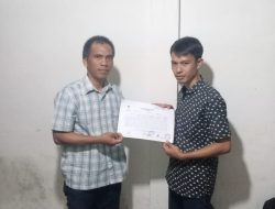 Penyerahan Hasil Rapat Pleno Desa Lawang Agung