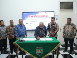 Penandatanganan NPHD Antara Pemkab Asahan dengan KPU Asahan
