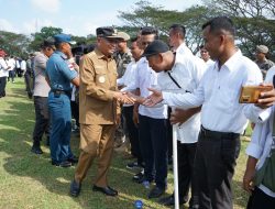 Bupati Asahan Kukuhkan Satlinmas Asahan