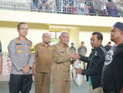 Bupati Asahan Serahkan Bantuan Beras