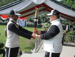 Wakil Bupati Asahan Terima Obor Api PON XXI Aceh-Sumut 2024.