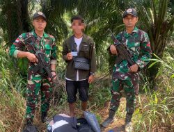 Satgas Pamtas RI-Malaysia Yonkav 12/BC Amankan Pekerja Migran Nonprosedural di Perbatasan