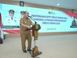 Bupati Asahan Dan Wakil Bupati Asahan Ikuti Penyerahan SPPT PBB-P2 Tahun 2025