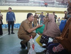 Pemerintah Kabupaten Asahan Menyerahkan Bantuan Beras Kepada 1000 Kaum Dhuafa