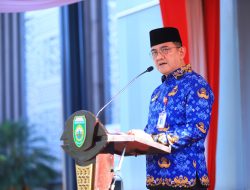 Pimpin Apel Gabungan Korpri Sumsel: Sekda Edward Candra Serahkan Santunan bagi 125 ASN Purna Tugas